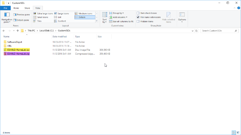 File Explorer window showing the &ldquo;CustomISOs&rdquo; folder, which contains two folders: &ldquo;SoftwareDepot&rdquo; and &ldquo;VIBs,&rdquo; and two files: &ldquo;ESXi6U2-HomeLab.iso&rdquo; and &ldquo;ESXi6U2-HomeLab.zip.&rdquo; The file extensions are visible.