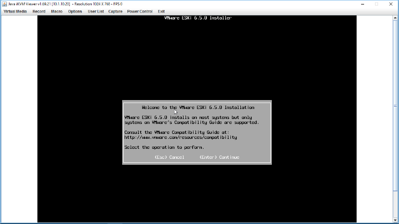 Screenshot of the VMware ESXi 6.5.0 installer interface with an option to continue or cancel the installation.